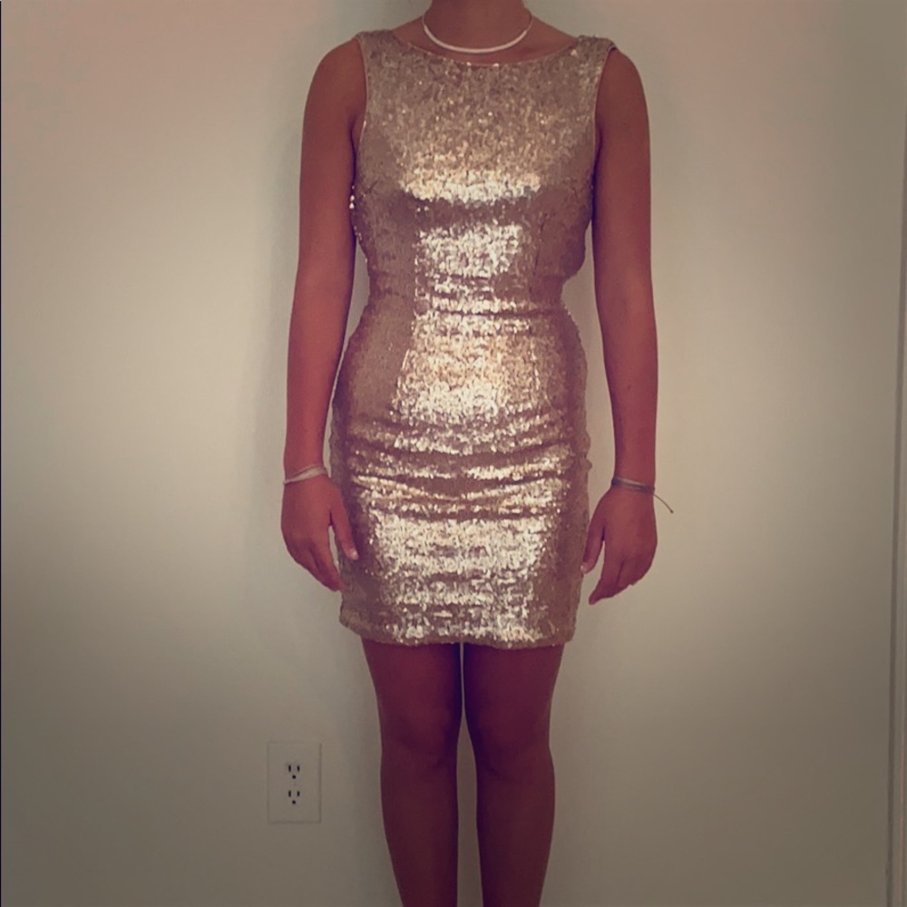 Women’s gold sequin dress